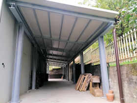 Tettoia garage laterale zincata La Loggia - Carpenteria metallica fabbro
